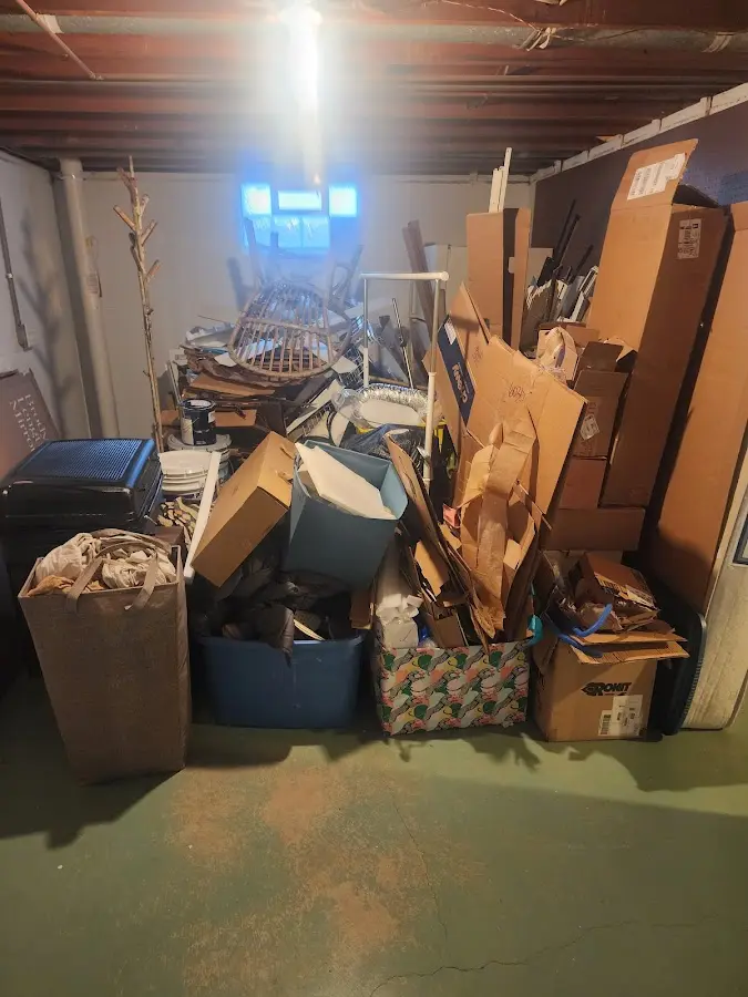 Roll-off dumpster container at job site for Concrete Dumpster Rental in Country Club